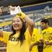 Michigan freshman Tsatsral Battsengel takes a picture inside the stadium on Saturday. Daniel Brenner I AnnArbor.com